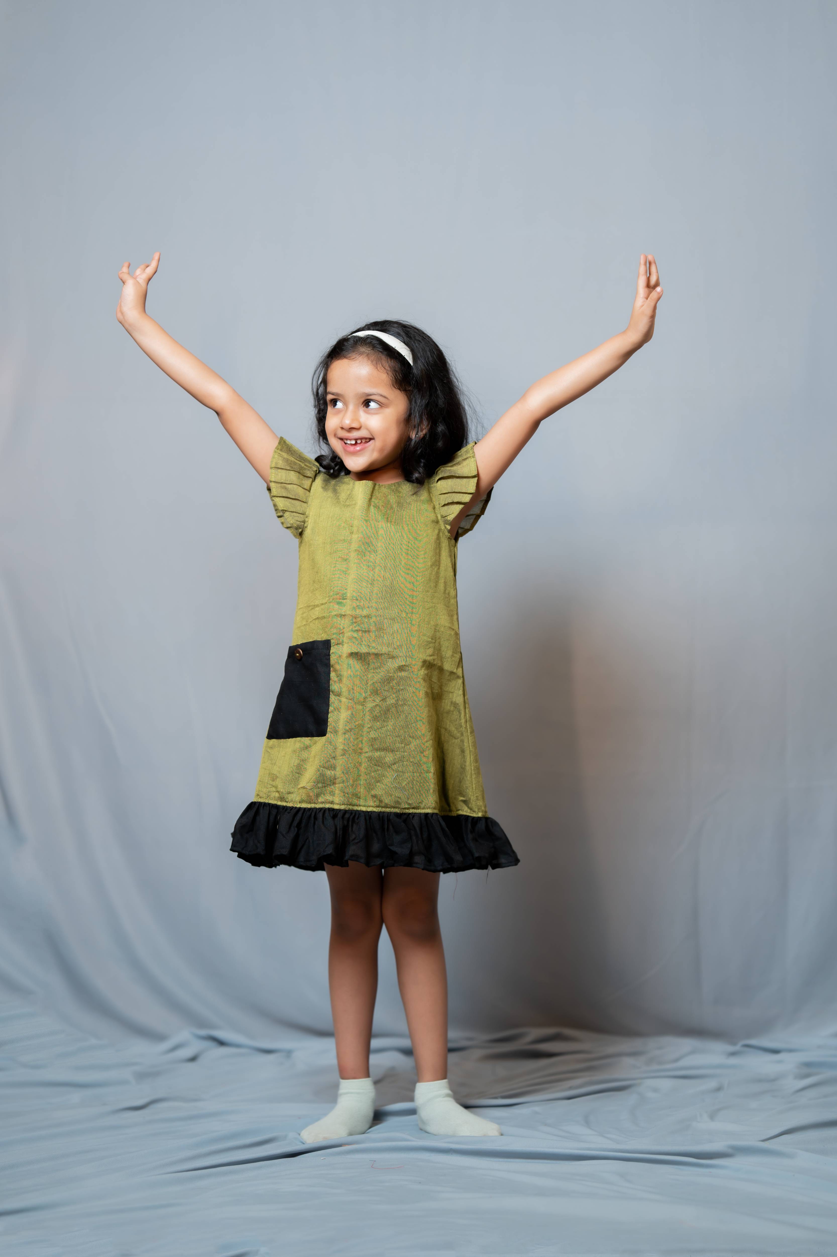 Ritu - Frill-frock in Mehndi-green with black in Khadi fabric