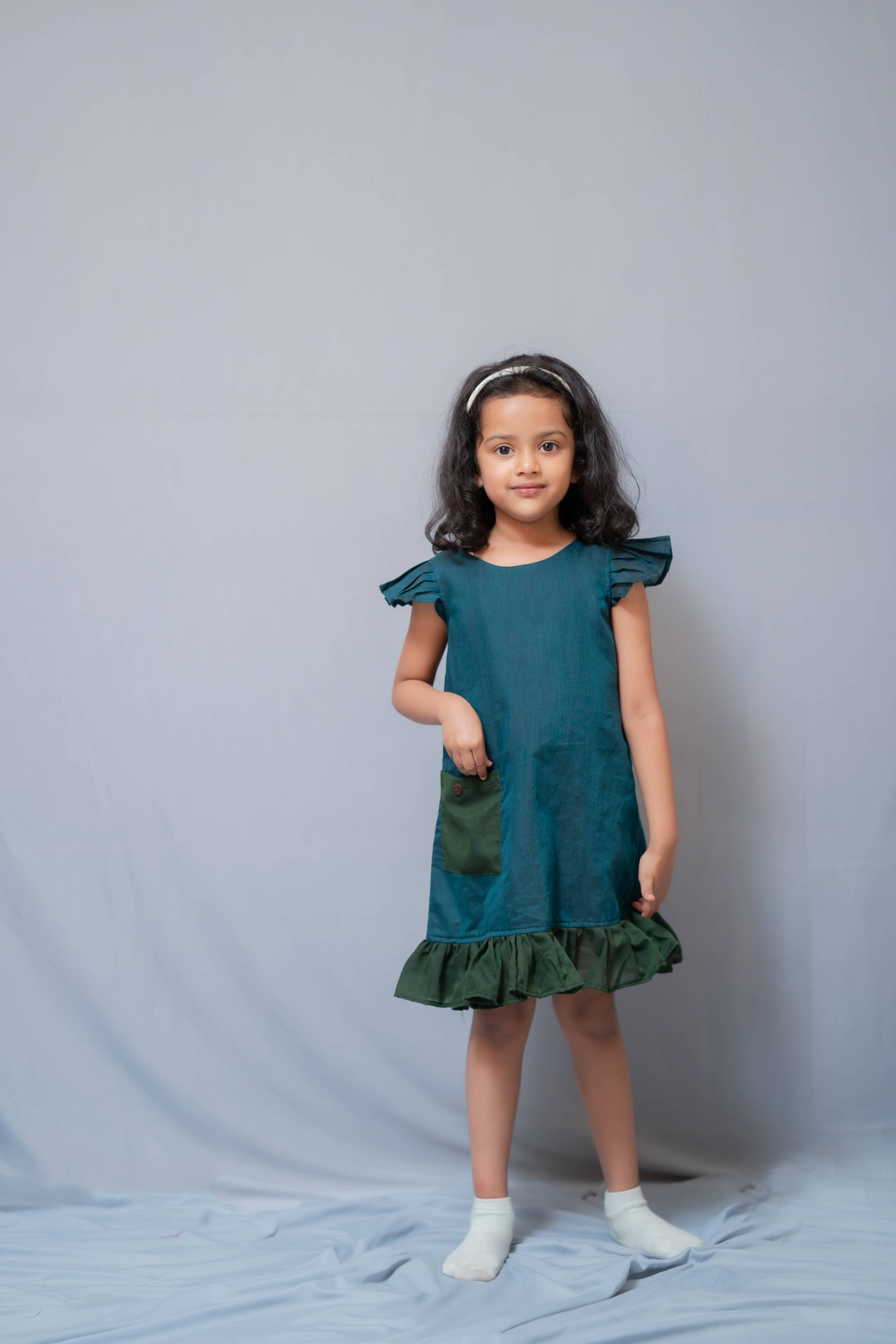 Ritu - Frill-frock in Teal with green in Khadi fabric