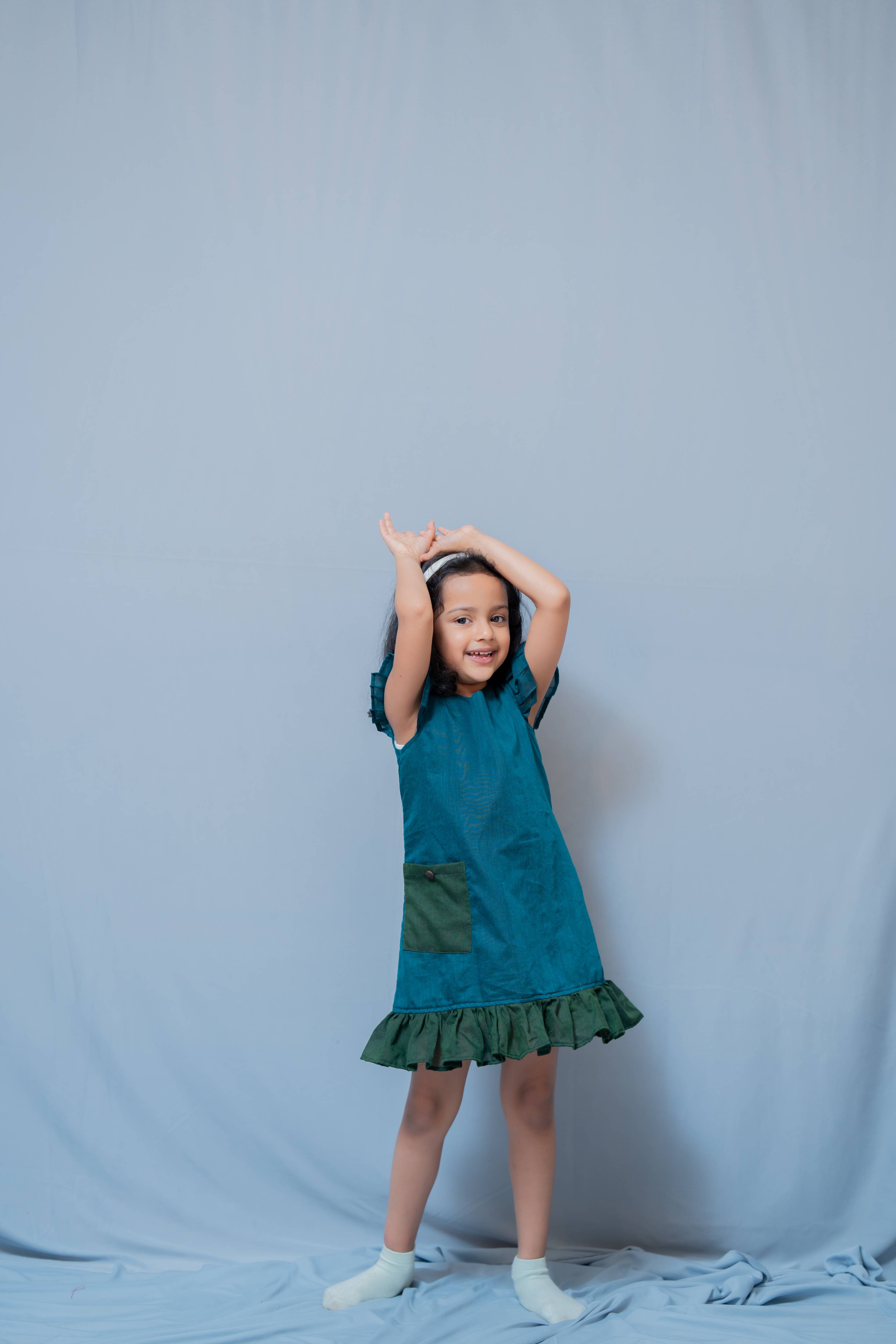 Ritu - Frill-frock in Teal with green in Khadi fabric