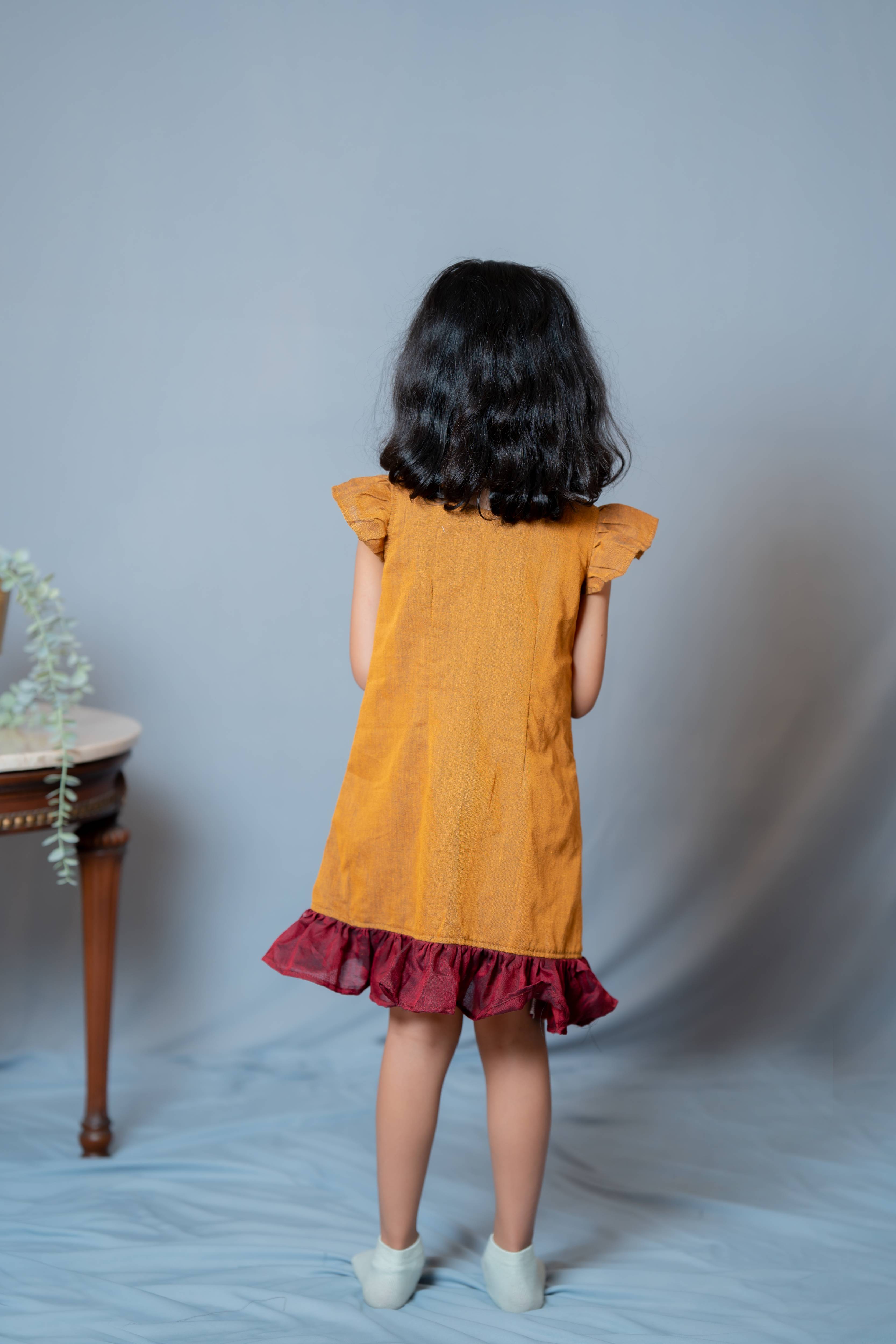 Ritu - Frill-frock in Mustard with red in Khadi fabric