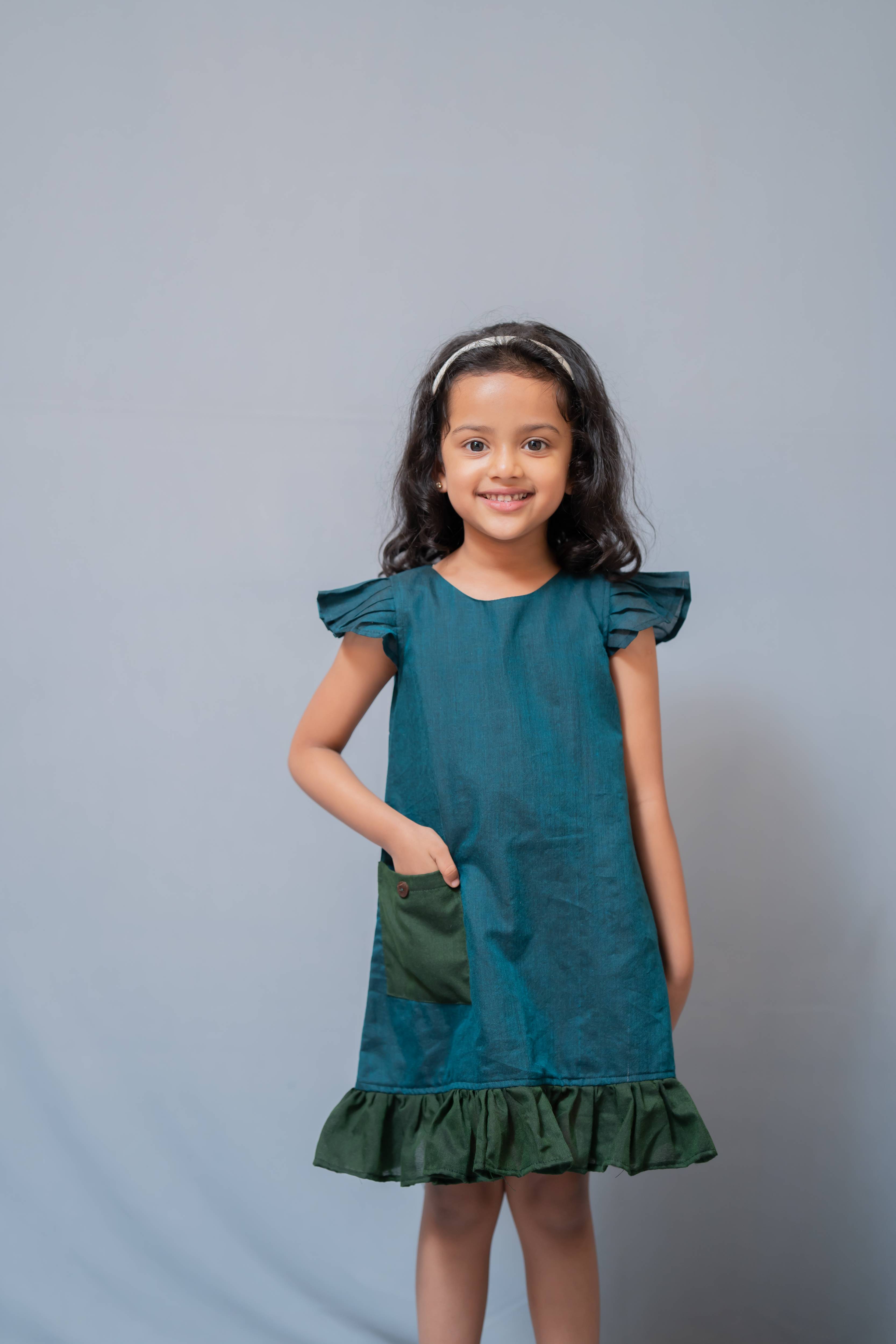 Ritu - Frill-frock in Teal with green in Khadi fabric