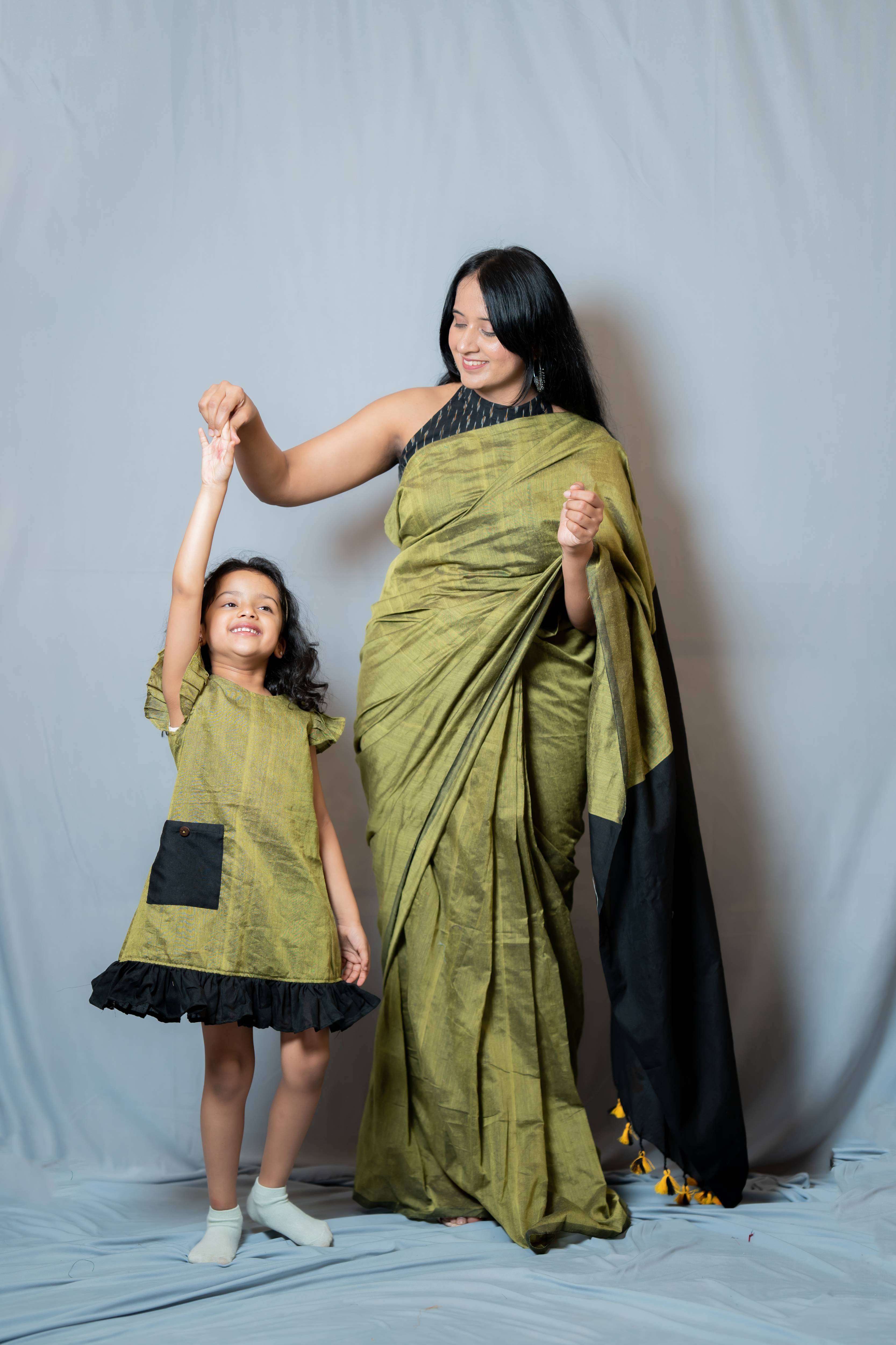 Ritu - Frill-frock in Mehndi-green with black in Khadi fabric