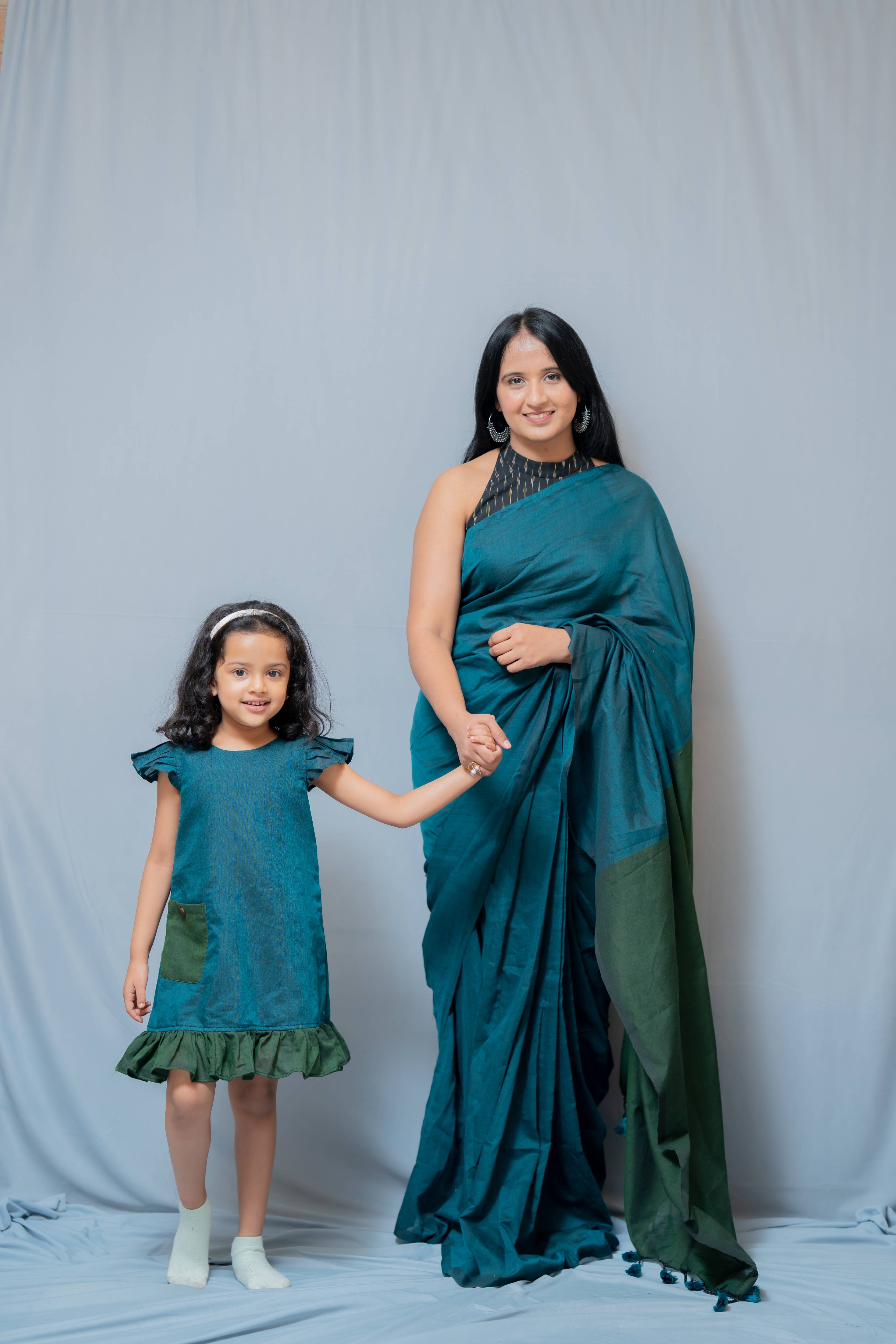 Ritu - Frill-frock in Teal with green in Khadi fabric