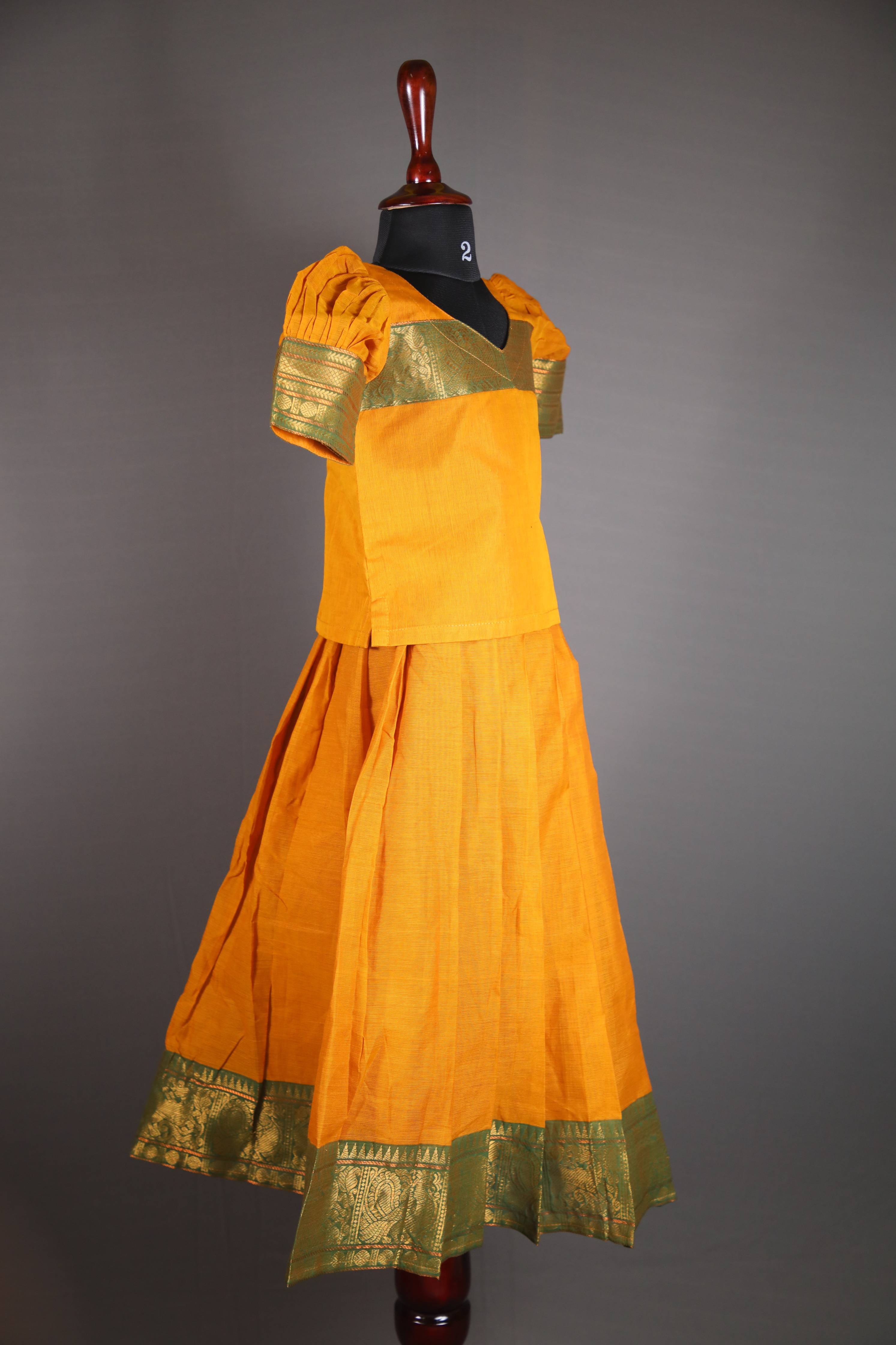 Siya - Pavada sattai in kanchi cotton in Mustard Yellow color