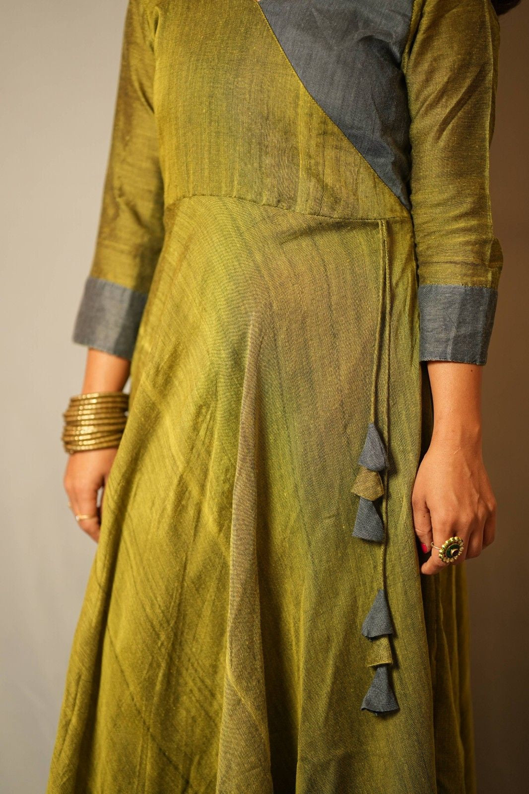 Suvarna - Angrakha dress in Khadi cotton in green with mustard contrast