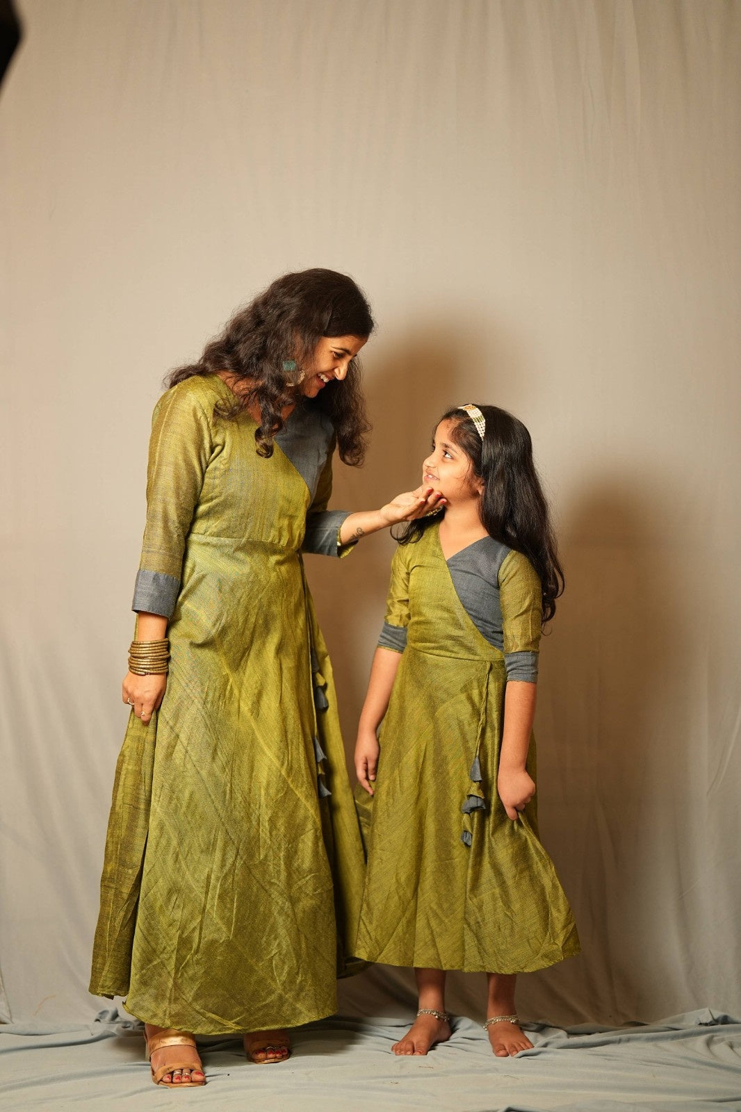 Suvarna - Angrakha dress in Khadi cotton in green with mustard contrast