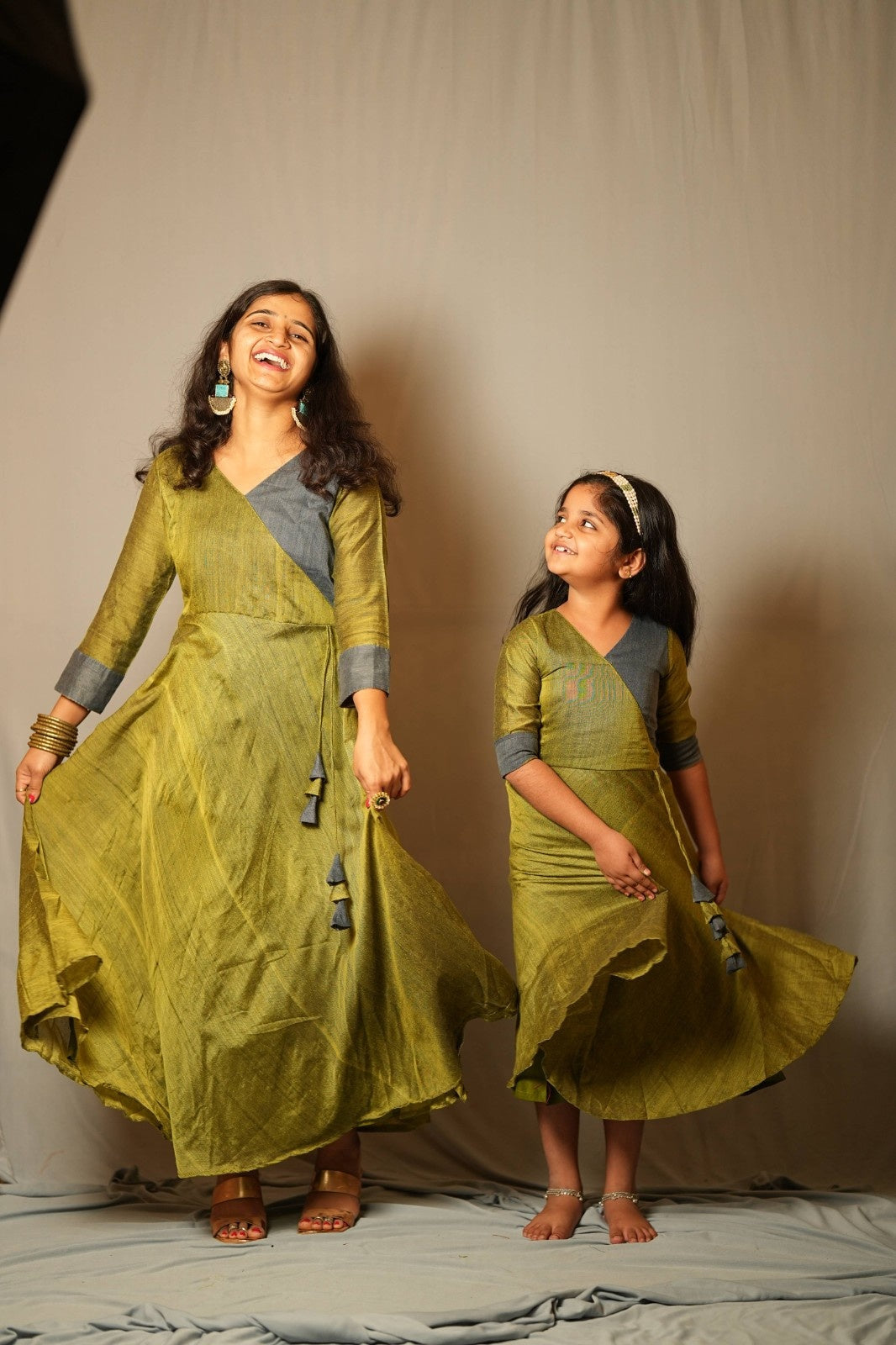 Suvarna - Angrakha dress in Khadi cotton in green with mustard contrast