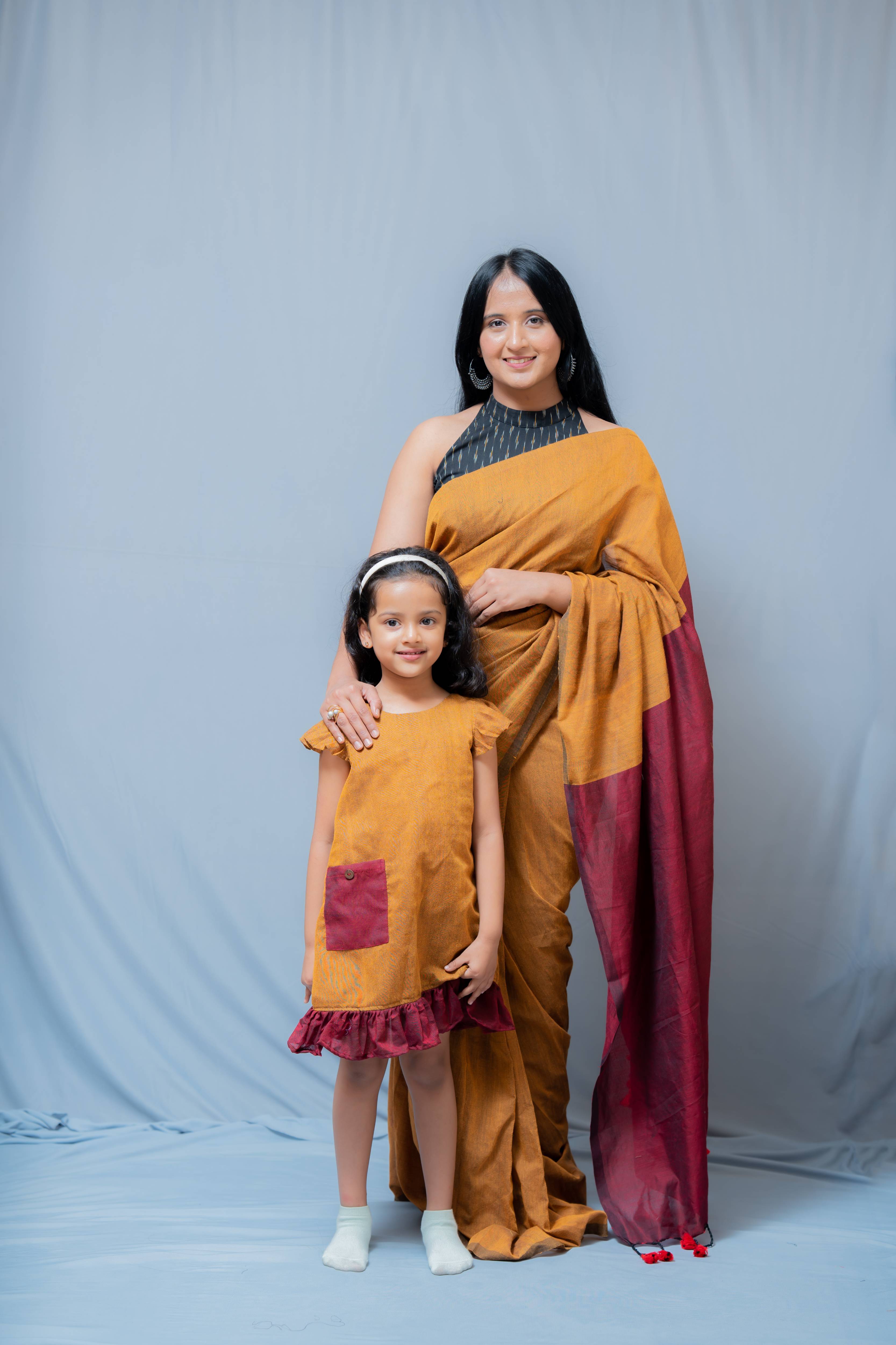 Ritu - Frill-frock in Mustard with red in Khadi fabric